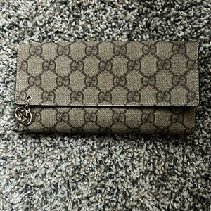 Gucci wallet with gold hardware